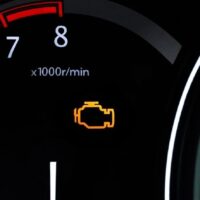 can a check engine light come on for oil change