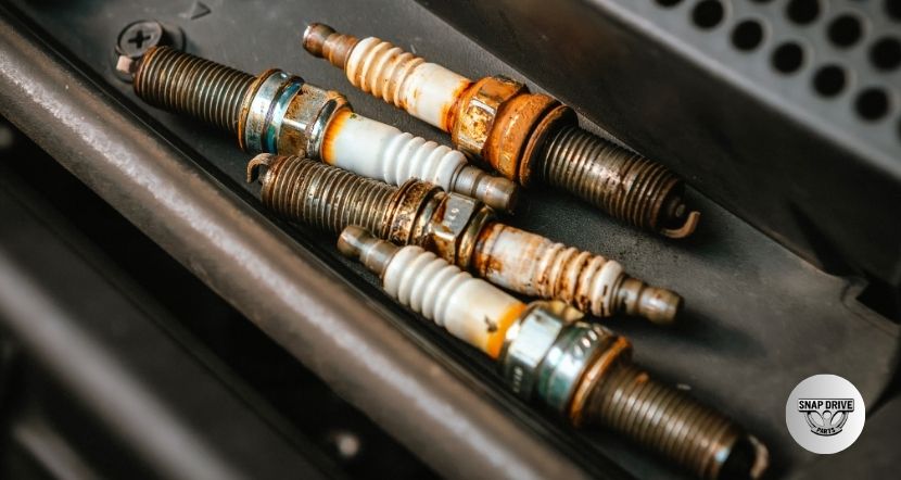 can spark plugs cause rough idle