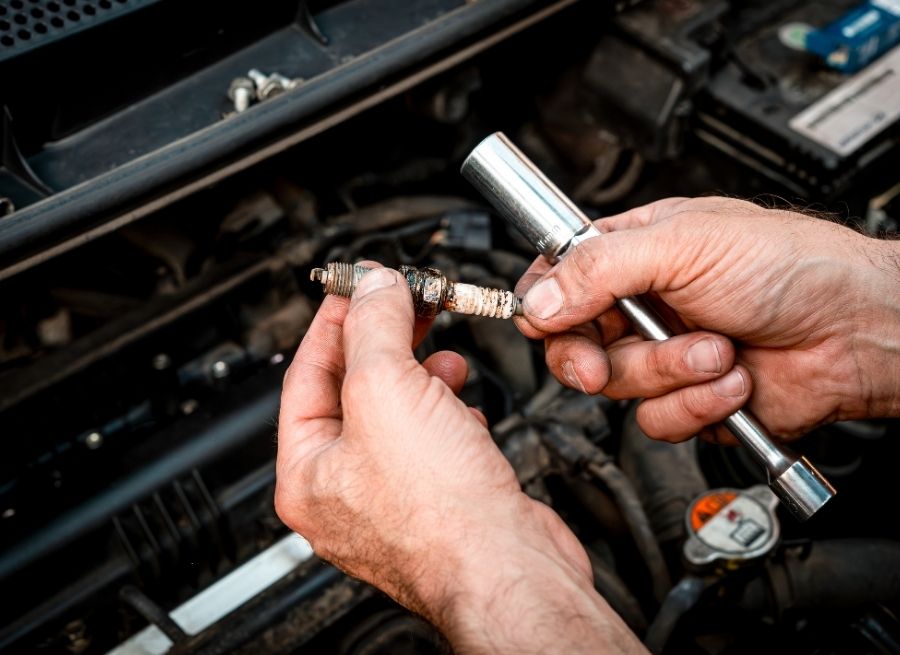 can spark plugs cause rough idle