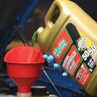 can you add coolant to a hot engine