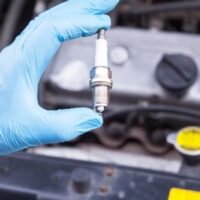 how to close spark plug gap