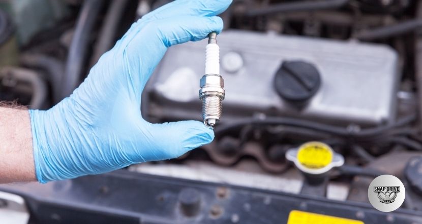 how to close spark plug gap