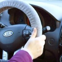 how to put on steering wheel cover