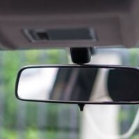 how to put rearview mirror back on