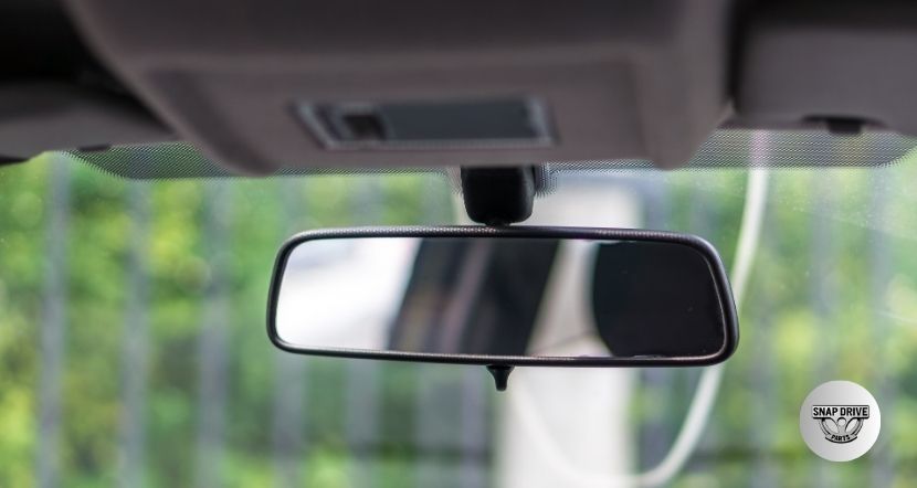 how to put rearview mirror back on