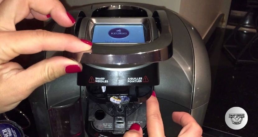 how to remove k cup holder