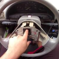 how to take a steering wheel cover off