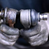 how to tell if ball joints are bad while driving