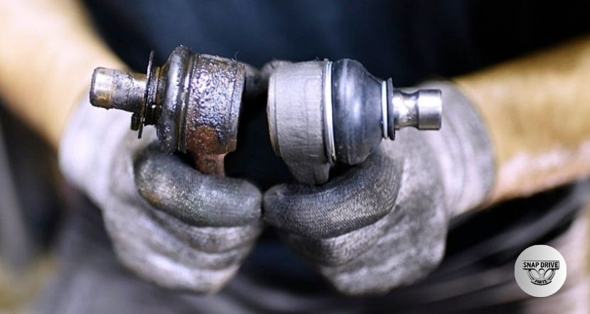 how to tell if ball joints are bad while driving