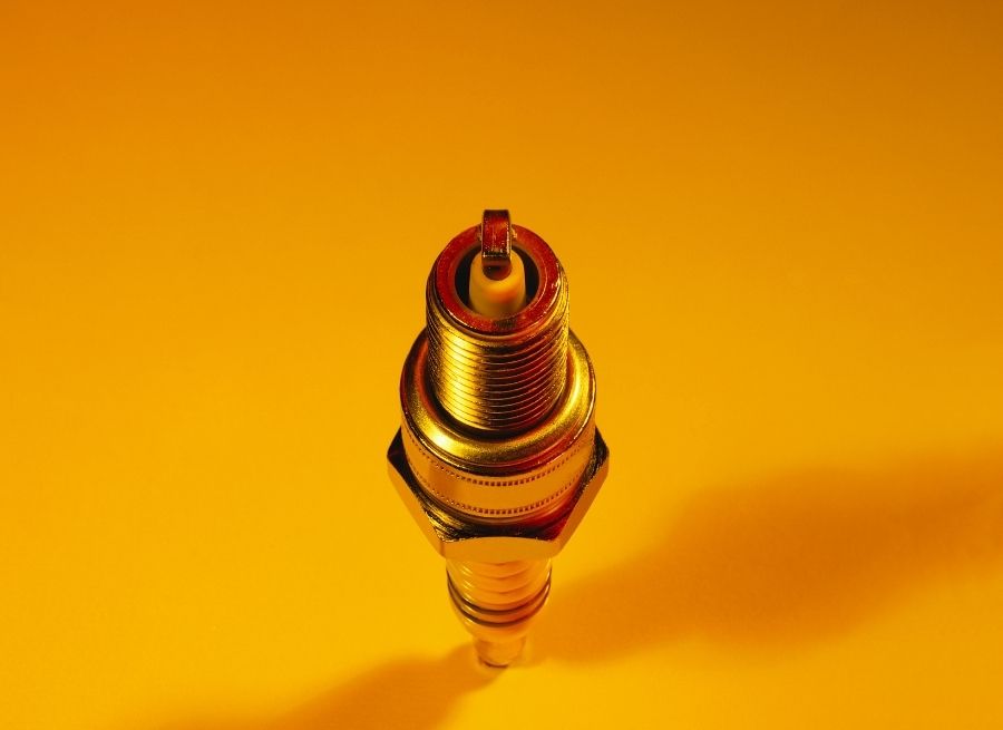 how to close spark plug gap